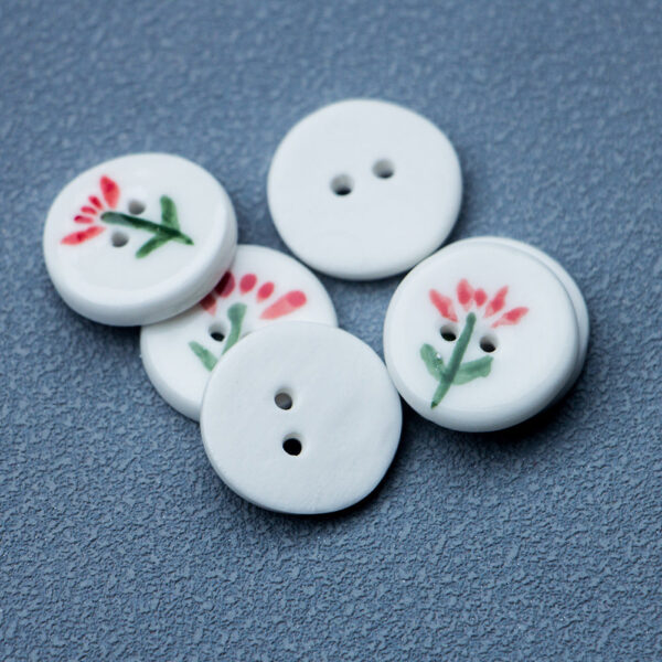 20mm Round White 2 Hole Ceramic Buttons with a Small Red Flower Design 4pcs - Image 3