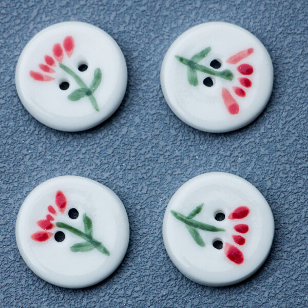20mm Round White 2 Hole Ceramic Buttons with a Small Red Flower Design 4pcs - Image 2