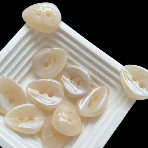 23x28mm Amber and Milky White 3D Melon Seed Shaped 2 Hole Resin Buttons 40pcs - Image 3