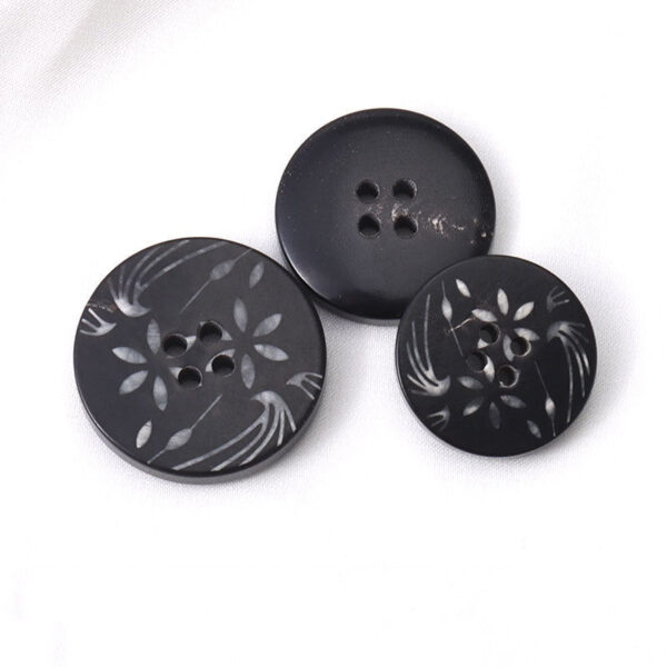 15 - 25mm Round 4 Hole Black Horn Buttons with White Flower Patterns 10pcs - Image 2