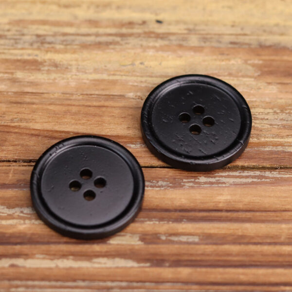 18-40L Bovine Bone Black Painted Round-Edged Four-Hole Buttons 12pcs - Image 2
