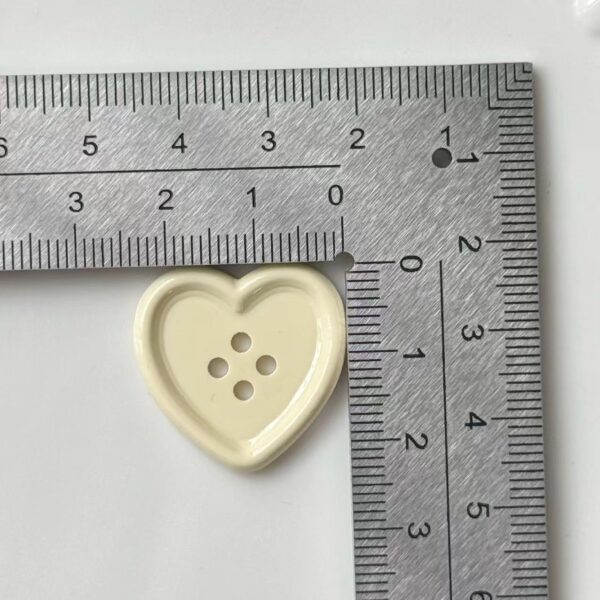 25mm Shiny Beige Heart Plastic Craft Buttons 40pcs - Image 2
